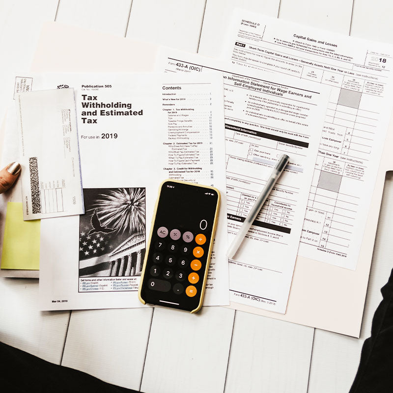 phone with tax documents